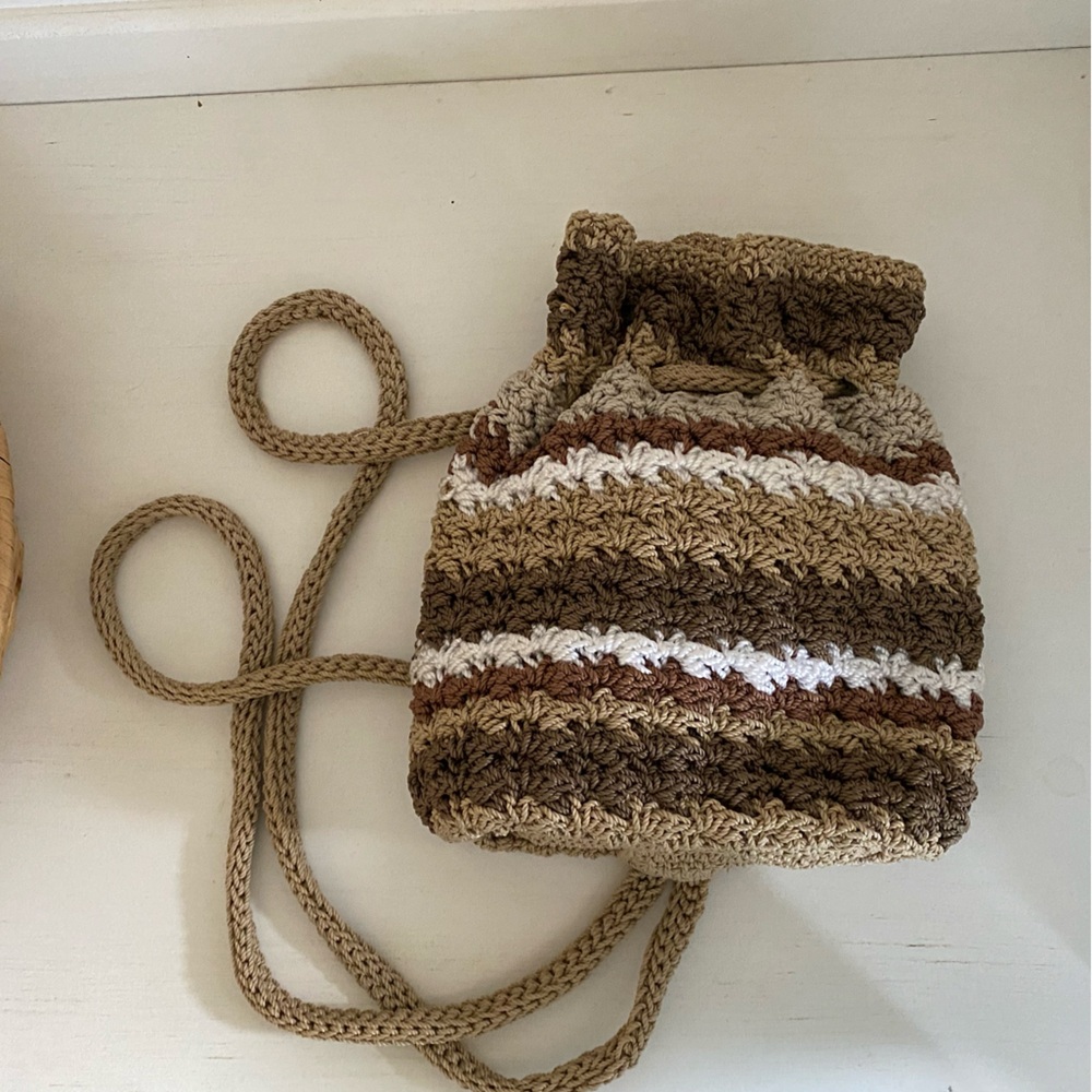 The Sak Crochet Drawstring Bag - Brown and Cream mini backpack